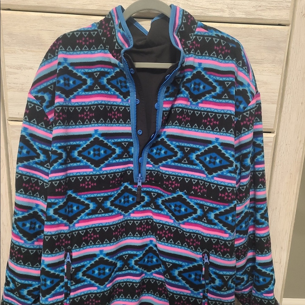 Reversible Jacket. Fleece on one side / nylon on other